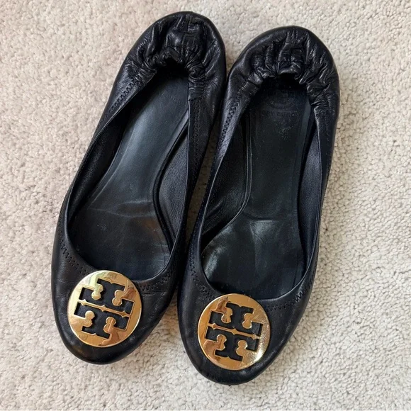 Tory Burch Black Flats with Gold Emblem - Picture 2 of 11